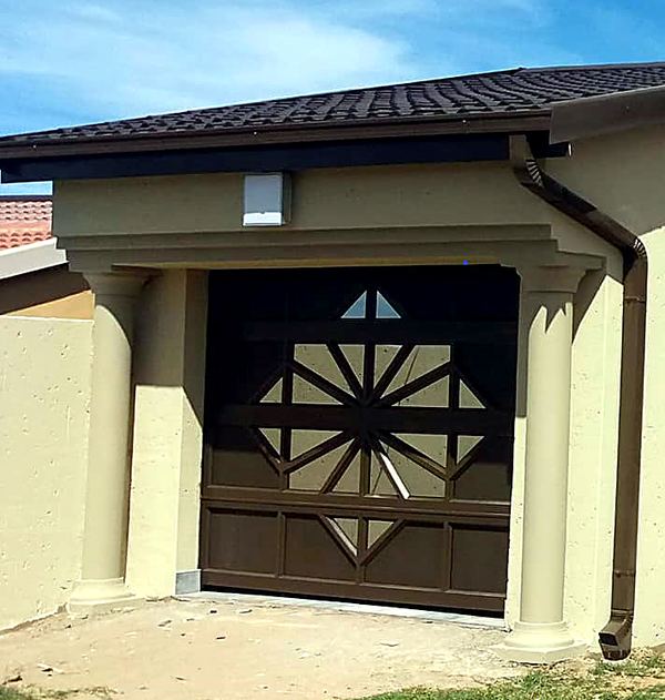 Decorative aluminium garage door by TJ Group