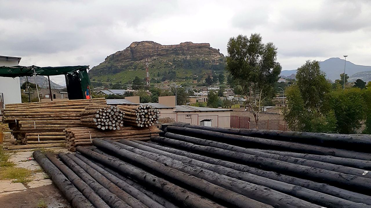 TJ Group yard in Butha-Buthe beneath the town's mesa